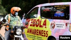 An Ebola Awareness van drives along Kyadondo Road amid an Ebola outbreak, in Kampala, Uganda, Oct. 27, 2022.