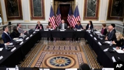 Doug Emhoff, center, the husband of Vice President Kamala Harris, speaks during a roundtable discussion with Jewish leaders about the rise in antisemitism, at the Eisenhower Executive Office Building on the White House Campus in Washington, Dec. 7, 2022.