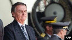 FILE - Then-President Jair Bolsonaro attends a graduation ceremony at the Agulhas Negras Military Academy in Resende, Rio de Janeiro state, Brazil, on Nov. 26, 2022.