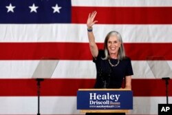 Assistant House Democratic leader, Rep. Katherine Clark waves on stage during a Democratic election night party, Nov. 8, 2022, in Boston. Clark will become the Democratic whip.
