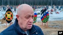FILE - Wagner Group head Yevgeny Prigozhin is seen at the Beloostrovskoye cemetery outside St. Petersburg, Russia, Dec. 24, 2022.