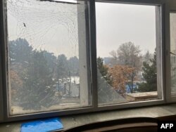 A suicide blast shattered windows near Afghanistan's foreign ministry in Kabul, Jan. 11, 2023.