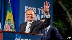 Rick Caruso, a Democratic candidate for mayor of Los Angeles, waves to supporters attending a primary election campaign event in Los Angeles, June 7, 2022. 
