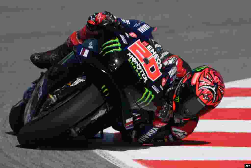 Yamaha French rider Fabio Quartararo takes a curve during the first MotoGP free practice session of the Moto Grand Prix de Catalunya at the Circuit de Catalunya in Montmelo on the outskirts of Barcelona.