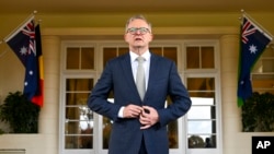 Australian Prime Minister Anthony Albanese reacts after a swearing-in ceremony for his Cabinet at Government House in Canberra, Australia, June 1, 2022. 
