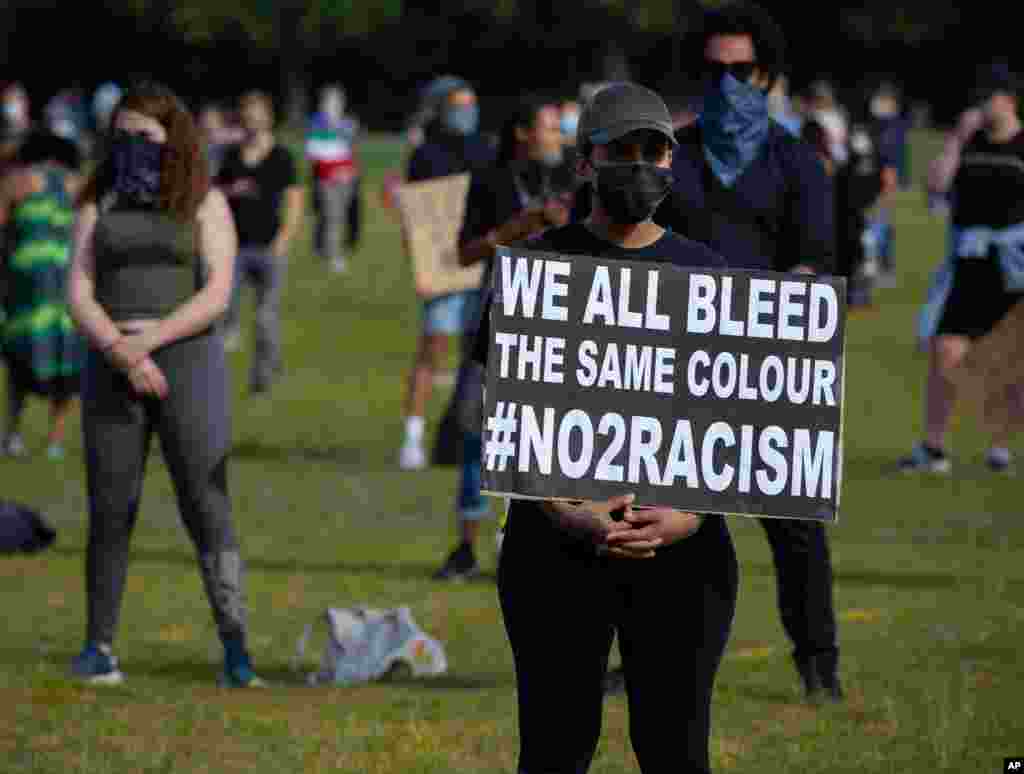 People observe social distancing as they take part in a demonstration in The Hague, Netherlands, June 2, 2020, to protest against the death of George Floyd, police violence and institutionalized racism.