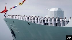FILE - China's frigate Huangshan is seen anchored in the waters off RSS Singapura Changi Naval Base, in Singapore, May 15, 2017. 