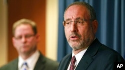 FILE - U.S. Attorney Andrew Luger speaks at a news conference in Minneapolis, April 20, 2015.
