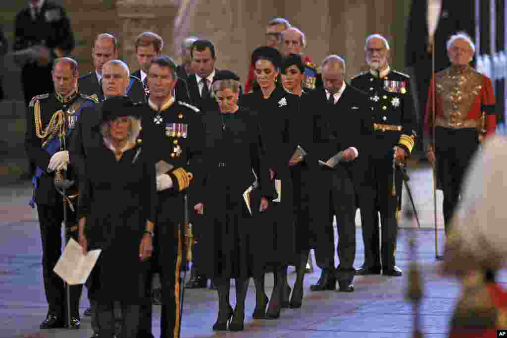 Camilla, Queen Consort, and other members of the Royal family stand inside the Palace of Westminster as Queen Elizabeth II lies in state in London, Sept. 14, 2022.&nbsp;