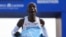 FILE - Kenya's Eliud Kipchoge crosses the line to win the Berlin Marathon in Berlin, Germany, Sept. 25, 2022.