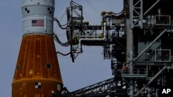 The NASA moon rocket stands on Pad 39B before the Artemis 1 mission to orbit the moon at the Kennedy Space Center, Friday, Sept. 2, 2022, in Cape Canaveral, Fla. (AP Photo/Brynn Anderson)