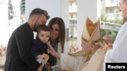 Pope Francis meets faithful as he visits Matera for the conclusion of the 27th National Eucharistic Congress in Matera, Italy, Sept. 25, 2022. (Vatican Media/­Handout via Reuters) 