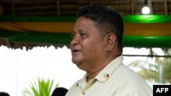 FILE - Palau's Minister of State Gustav Aitaro attends a press conference in Ngerulmud, Palau, July 9, 2022.