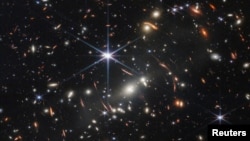 The first full-color image released by NASA from the James Webb Space Telescope shows the galaxy cluster SMACS 0723, in a composite made from images at different wavelengths taken with a Near-Infrared Camera and released July 11, 2022. (NASA)