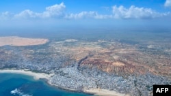 Cette photo publiée et prise le 18 décembre 2012 par l'UA-UN IST montre une vue aérienne de Marka, à environ 70 km au sud-ouest de Mogadiscio. La ville a été libérée par les forces de l'AMISOM en août 2012.