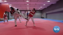 Afghan Taekwondo Competitor Says She Will 'Never' Fight Under Taliban Flag