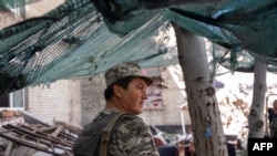 A Ukrainian soldier keeps position on the front line in Mykolaiv region on July 23, 2022, amid the Russian invasion of Ukraine.
