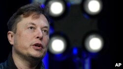 FILE - Elon Musk speaks at the SATELLITE Conference and Exhibition in Washington. 