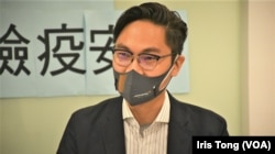 油尖旺区议会副主席朱子洛表示，如果选举制度不变，民主党会继续参与明年的区议会选举 (美国之音/汤惠芸)