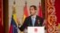 FILE - The leader of Venezuela's political opposition Juan Guaido makes a speech at the Madrid regional government building during a visit to Madrid, Spain, Jan. 25, 2020. 