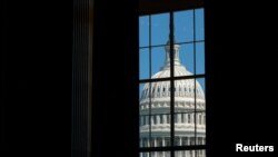 FILE - The U.S. Capitol dome is seen from the Cannon House Office Building on Capitol Hill in Washington, July 14, 2022. 
