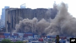 This frame grab from video shows dust rising from silos in the port of Beirut, Lebanon, July 31, 2022.
