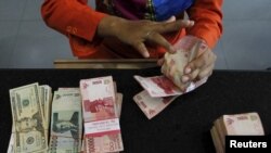 Ilustrasi - Rupiah telah melemah lebih dari delapan persen tahun ini, menguat 1,3 persen dan menikmati nilai tukar terbaiknya dalam periode hampir tiga pekan ini.