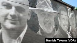 نقاشی دیواری در جورج‌تاون. تصویر مراد طاهباز در این نقاشی دیده می‌شود