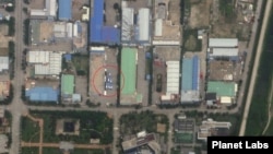 한국 제씨콤 공장 부지에 버스 8대가 서 있는 모습. 자료=Planet Labs