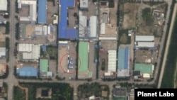 한국 제씨콤 공장 부지에 버스 8대가 서 있는 모습. 자료=Planet Labs