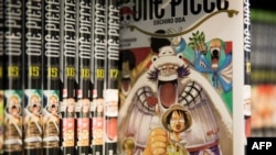 FILE - 'One Piece' comic books are displayed at the Paris Book Fair 2019 at the Parc des Expositions in Paris, March 18, 2019.