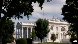 FILE - The White House is seen, July 30, 2022, in Washington. President Joe Biden tested positive for COVID-19 again Saturday, slightly more than three days after he was cleared to exit coronavirus isolation.
