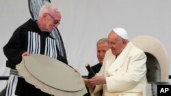 Pope Francis meets young people and elders at Nakasuk Elementary School Square in Iqaluit, Canada, July 29, 2022. The pope was at the capital of Nunavut to meet with Inuit Indigenous people, including survivors of residential schools, on his final day in Canada.