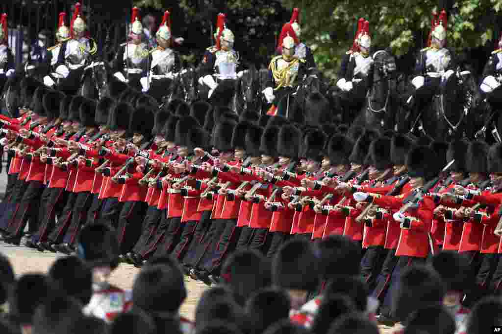 Members of the Household Division march during the Trooping the Color parade, in London, June 2, 2022.