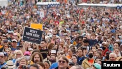 People participate in the March for Our Lives, one of a series of nationwide protests against gun violence, on the National Mall in Washington, June 11, 2022. 