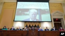 An image of a tweet by former President Donald Trump is displayed at a hearing held by the House select committee investigating the Jan. 6 attack on the US Capitol, June 9, 2022.