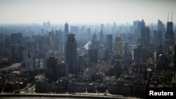 FILE - A view of the city skyline and Huangpu river in Shanghai, Feb. 24, 2022. 