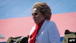 FILE - Valentina Matvienko, chairwoman of the Russian Federation Council, arrives to watch a military parade, which marks the 75th anniversary of the Soviet victory over Nazi Germany in World War II, at Red Square in Moscow, June 24, 2020. 