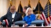 Members of the House select committee investigating the Jan. 6 attack on the U.S. Capitol, from left, Chairman Bennie Thompson, Rep. Adam Schiff, rear, and Vice Chair Liz Cheney, take their seats, at the Capitol in Washington, June 9, 2022.
