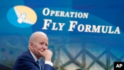 President Joe Biden listens as he meets virtually with infant formula manufacturers from the South Court Auditorium on the White House complex in Washington, June 1, 2022.