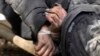A dead civilian with his hands tied behind his back lies on the ground in Bucha close to Kyiv, Ukraine, April 4, 2022.