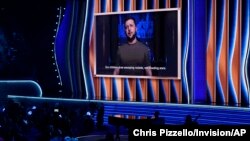 President of Ukraine, Volodymyr Zelenskyy, speaks on screen at the 64th Annual Grammy Awards on Sunday, April 3, 2022, in Las Vegas. (AP Photo/Chris Pizzello)