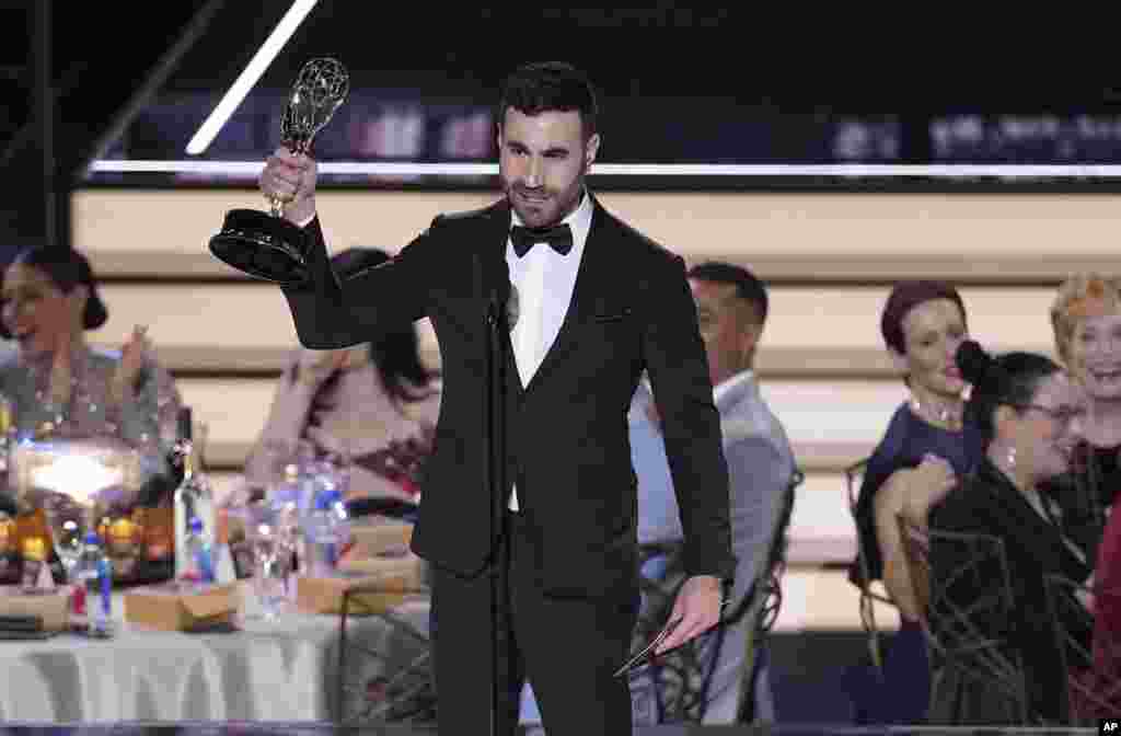 Brett Goldstein accepts the Emmy for outstanding supporting actor in a comedy series for &quot;Ted Lasso&quot; at the 74th Primetime Emmy Awards at the Microsoft Theater in Los Angeles, Sept. 12, 2022.