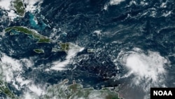 Tropical Storm Fiona is seen east of Puerto Rico in this Sept. 16, 2022, satellite image from the US National Oceanic and Atmospheric Administration.