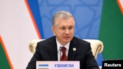 Uzbek President Shavkat Mirziyoyev attends an extended-format meeting of heads of the Shanghai Cooperation Organization member states at a summit in Samarkand, Uzbekistan Sept. 16, 2022.