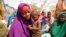 FILE - Nunay Mohamed, 25, who fled the drought-stricken Lower Shabelle area, holds her 1-year old malnourished child at a makeshift camp for the displaced on the outskirts of Mogadishu, Somalia, June 30, 2022. A hunger crisis has grown especially dire in the Horn of Africa.