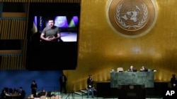 Ukrainian President Volodymyr Zelenskyy addresses the 77th session of the United Nations General Assembly via video message, at U.N. headquarters in New York, Sept. 21, 2022.