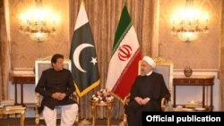 وزیر اعظم عمران خان اور ایران کے صدر حسن روحانی۔ (فائل فوٹو)