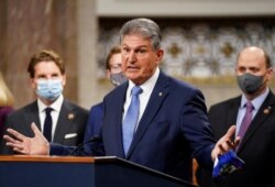 FILE - U.S. Senator Joe Manchin (D-WVA) speaks at a news conference on Capitol Hill in Washington, Dec. 1, 2020.