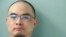FILE - This photo provided by the Butler County, Ohio, jail shows Xu Yanjun. Xu, a Chinese national convicted of trying to steal trade secrets from U.S. aviation and aerospace companies, has been sentenced to 20 years in prison.